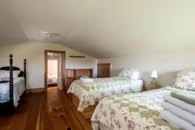 a bedroom with two beds in a room at Secluded Cottage Rental with a Fireplace in Greenville, New York in Greenville