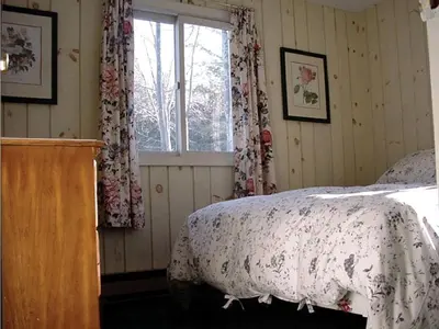a bedroom with a bed and a window at Secluded Family Mountain Rental with Fireplace in Windham, New York in Windham
