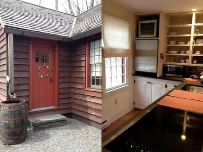 a kitchen and a red door in a house at Romantic Year-Round Cabin Getaway with Free Wi-Fi in Saugerties, New York in Saugerties