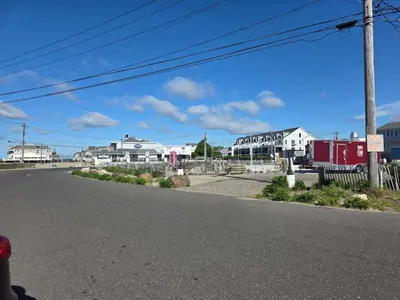 an empty street with houses on the side of the road at The Lordship Loft in Stratford
