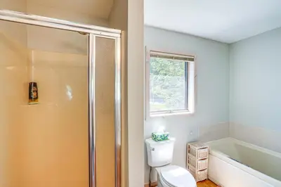 a bathroom with a shower and a toilet at Ski, Hike and More Year-Round Gem in Windham in Windham