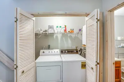 a small kitchen with a stove and a sink at Ski, Hike and More Year-Round Gem in Windham in Windham
