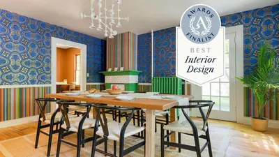 a dining room with a table and chairs with the best interior design at Relax in Style at Historic Modern on Main with Modern Amenities Wooded Views in Stone Ridge