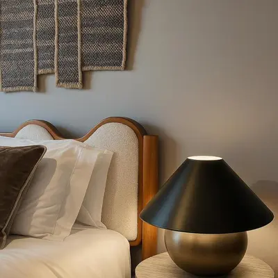 a lamp sitting on a table next to a bed at Modern and Harford Center 1-BR Near XLCenter and ConventionCenter in Hartford