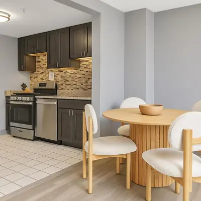 a kitchen with a wooden table and chairs at Modern and Harford Center 1-BR Near XLCenter and ConventionCenter in Hartford