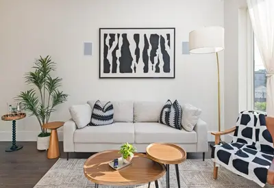 a living room with a couch and a table at Travelers Dream that's Mins to NYC having Game Room and Parking in Jersey City