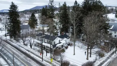 an aerial view of a house in the snow at Book Village Inn - Twain Room Queen Bed in Hobart