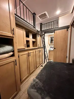 a bedroom with a bunk bed and a ladder in it at Luxury Lakeside Retreat - The Cozy Wondrous Weekendator in Lake Ariel