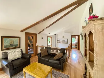 a living room with leather furniture and a fireplace at Mountain Lodge Retreat, Near New Paltz & Hikes in New Paltz