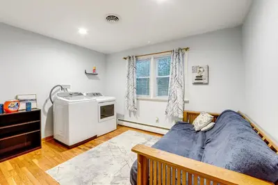 a living room with a couch and a stove at Less Than 1 Mi to Main St Rural Gem in Cherry Valley in Cherry Valley