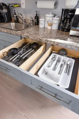 an open drawer in a kitchen with utensils at Peaceful Hideaway - NYC & NWK with free parking in Newark