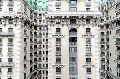 a tall white building with many windows and balconies at Blueground Upper West Side wd nr Central Park NYC-1860 in New York