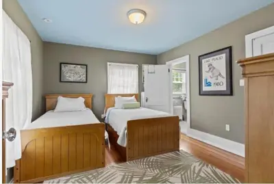 a bedroom with two beds and a window at Majestic Family Home in Saratoga New York in Saratoga Springs