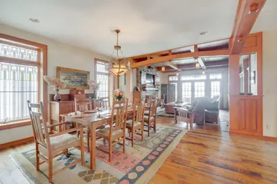 a dining room with a table and chairs at Luxe Family Home on Orange Lake with Private Dock! in Newburgh