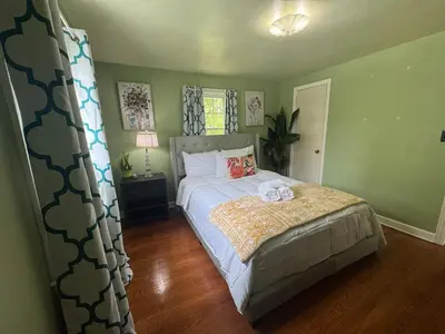 a bedroom with a bed in a room at Cozy Home in New Britain