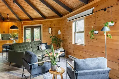 a living room with a couch and chairs and a table at The Lily Pad - Hunter NY in Elka Park
