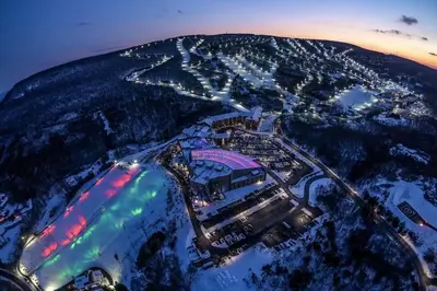 an aerial view of a city at night at The Cozy Modern Cabin Ski & Relax in Tobyhanna