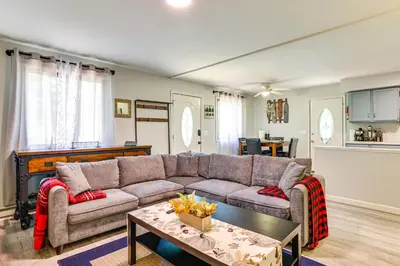 a living room with a couch and a table at Walk to Lake Carobeth Gem in Pocono Country Place in Tobyhanna