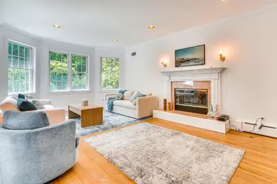 a living room filled with furniture and a fireplace at Serene Hudson Valley Escape with Pool and Grill in Carmel