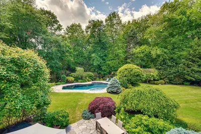 an aerial view of a garden with a swimming pool at Serene Hudson Valley Escape with Pool and Grill in Carmel