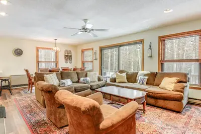 a living room with couches and a table at 3 min to Mt Snow with FREE Shuttle! Family-Size fun, Wood fireplace, 2 living rooms, Arcades in Dover