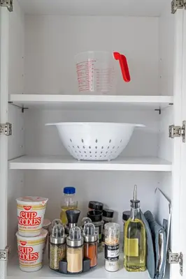 a shelf with a bowl and other food items in a refrigerator at Style & Comfort 3 Rooms -15 min from NYC in West New York