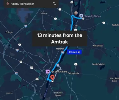 a map of miles from the airport at Nintendo, Filtered H2O, Cafe, Central, Self-Check in Troy