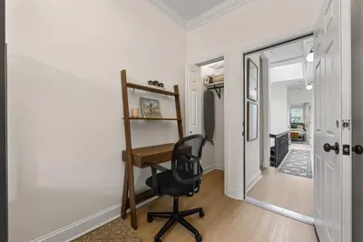 a home office with a desk and a chair at 3BR Harlem Stay with Washer with Dryer in New York
