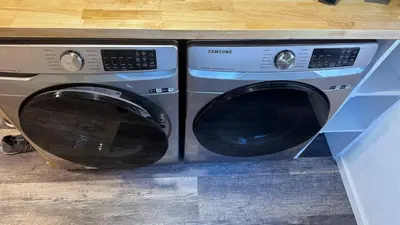 a washer and dryer sitting in a kitchen at Oscawana Lake Escape in Putnam Valley