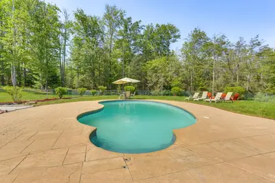 an image of a swimming pool in a yard at Home Theater and Game Room Home in Glen Wild! in Glen Wild