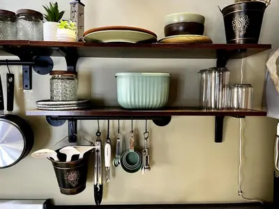 a kitchen shelf with utensils on it at Incredible Equipped Yurt Amazing for a Glamping Experience in East Meredith, New York in East Meredith