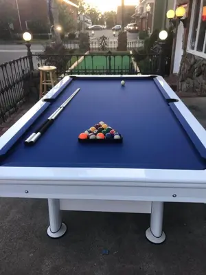 a pool table with balls on top of it at Stay Saratoga in Saratoga Springs