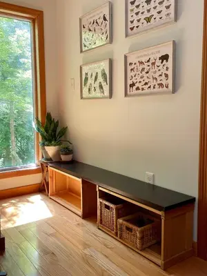 a living room with a table and a window at Copake Lakes Hidden Treasure in Copake