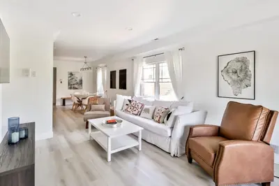 a living room with a couch and a table at Trailside Escape 2BR Views Fireplace & Balcony in Hunter