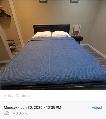 a bed in a room with a blue mattress at Classic Comfort Room Near LAGUARDIA AIRPORT in North Beach
