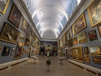 a hallway of a museum with paintings on the walls at Enchanting 3BR Near Downtown Hartford Cozy & Modern with Parking in Hartford