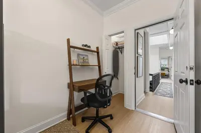 a home office with a desk and a chair at 3BR Brownstone near Subway & Columbia Uni in New York