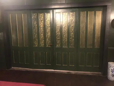 a pair of doors in a room at The Pulpit House