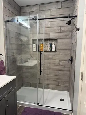 a shower with a glass door in a bathroom at The Pulpit House