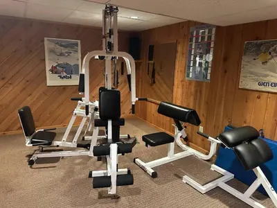 a gym with several exercise bikes in a room at Waterfront Paradise in St James in Nissequogue