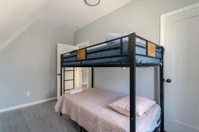 a bedroom with a bunk bed and a bunk bedouble at Modern House in Black Rock in Bridgeport
