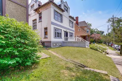 a large white house with a large yard at Walk to Nott Memorial Studious Retreat Near Eats in Schenectady