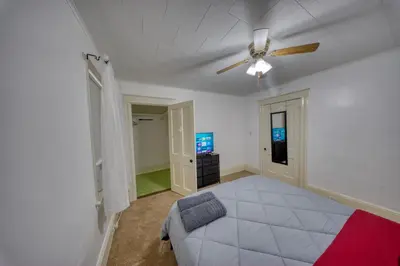 a living room with a ceiling fan and a couch at Charming 2-Bedroom, 1-Bath Getaway in Carbondale