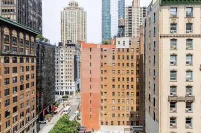 a view of a city with tall buildings at Blueground Midtown West washerdryer nr Central Park NYC-1876 in New York