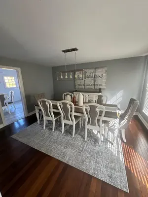 a dining room with a table and chairs at 4BR Winter Escape Ski & Wineries in Sussex