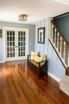 a living room with a couch and stairs at 4BR Winter Escape Ski & Wineries in Sussex