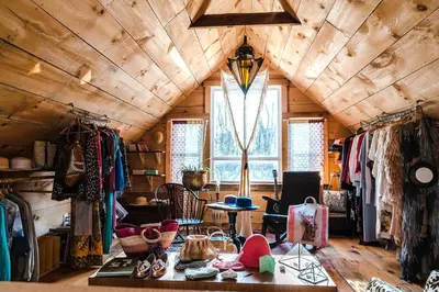 a room with a table with a lot of clothes at Cozy Unique Dome for a Romantic Glamping Getaway on a Private Farm in Woodridge, New York in Woodridge
