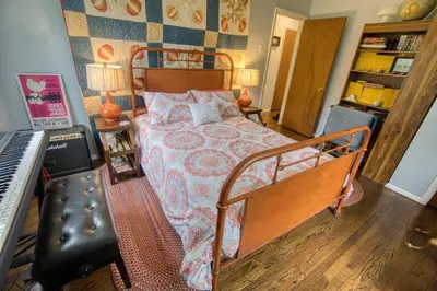 a bedroom with a bed and a keyboard in it at Catskills Getaway 3BR Retreat with Media Room, Near Casino, Bethel Woods and More in Glen Wild