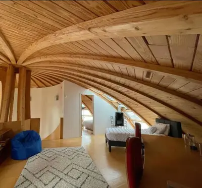 a living room with a large wooden ceiling at Dome 2Home Villa - Hot Tubs, Sauna & Piano in New Paltz