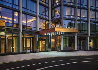 a building with a sign that reads the groynes at The George Manhattan, Tapestry Collection By Hilton in New York